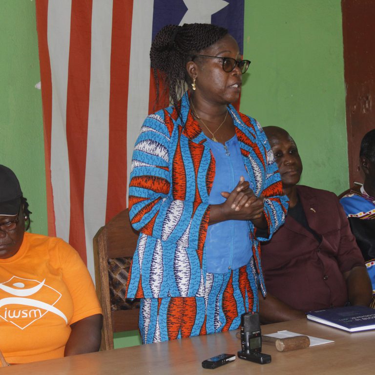 Health Minister, Wilhelmina Jallah speaking to elders of Bomi County
