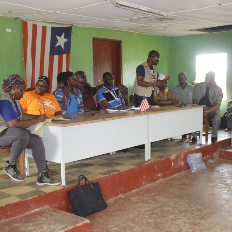 From left to right: Executive Secretary, Family Health Director, Minister of Health, Superintendent, Community Health Director, County Health Director